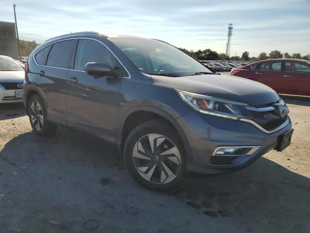 Photo 4 from auction – 2016 HONDA CR-V TOURI with VIN 5J6RM4H99GL106598