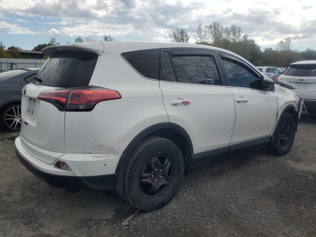 Photo 3 from auction – 2018 TOYOTA RAV4 LE with VIN 2T3BFREV4JW852879