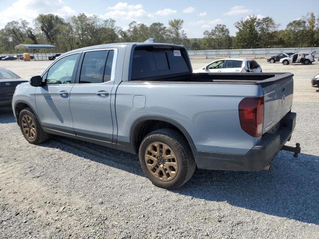 Photo 2 from auction – 2023 HONDA RIDGELINE with VIN 5FPYK3F52PB065274