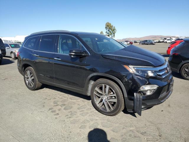 Photo 4 from auction – 2016 HONDA PILOT TOUR with VIN 5FNYF6H90GB077874