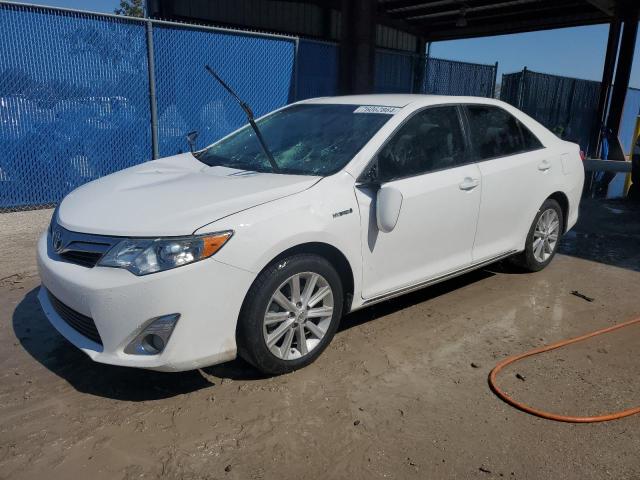 TOYOTA CAMRY HYBR 2012 with VIN 4T1BD1FKXCU012483 - Photo from auction