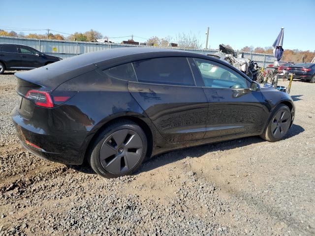 Photo 3 from auction – 2022 TESLA MODEL 3 with VIN 5YJ3E1EB8NF110785