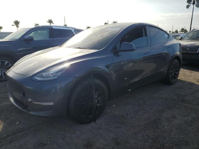 TESLA MODEL Y 2023 with VIN 7SAYGDEE5PA057848 - Photo from auction