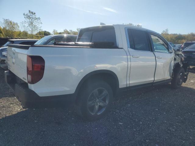 Photo 3 from auction – 2022 HONDA RIDGELINE with VIN 5FPYK3F53NB021006