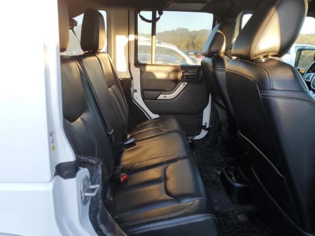 Photo 10 from auction – 2016 JEEP WRANGLER U with VIN 1C4BJWFGXGL132124