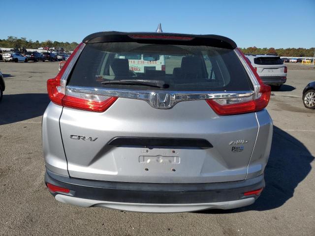 Photo 6 from auction – 2017 HONDA CR-V LX with VIN 2HKRW6H38HH205751