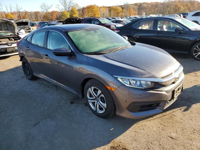 Photo 4 from auction – 2018 HONDA CIVIC LX with VIN 19XFC2F50JE202748
