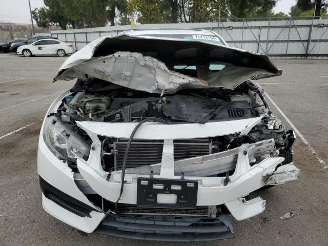 Photo 5 from auction – 2018 HONDA CIVIC LX with VIN 19XFC2F75JE038527