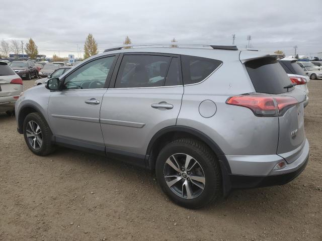 Photo 2 from auction – 2018 TOYOTA RAV4 LE with VIN 2T3BFREV0JW735090