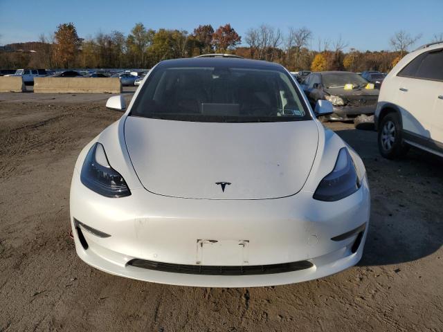 Photo 5 from auction – 2022 TESLA MODEL 3 with VIN 5YJ3E1EBXNF228577