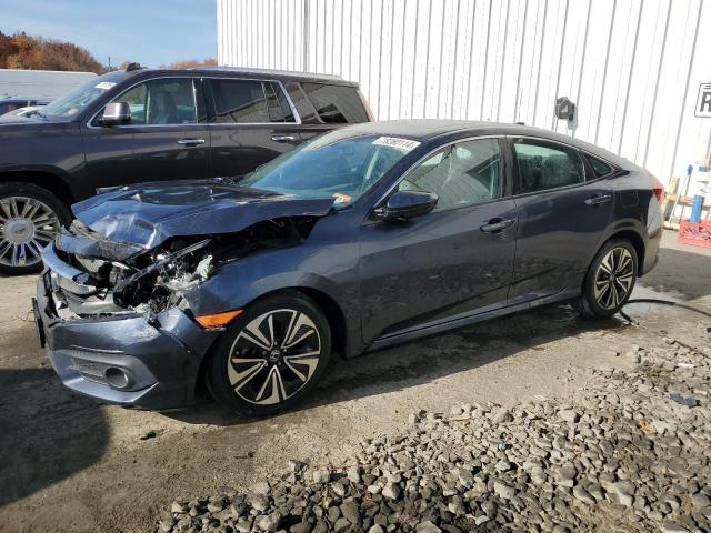 Photo 1 from auction – 2017 HONDA CIVIC EX with VIN 2HGFC1F32HH655052