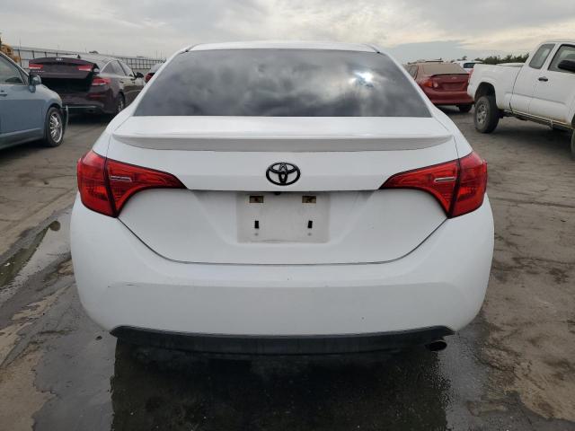 Photo 6 from auction – 2017 TOYOTA COROLLA L with VIN 5YFBURHE5HP692775