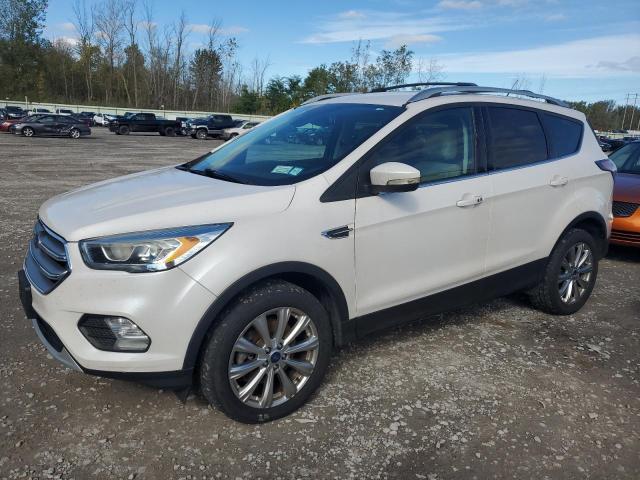 FORD ESCAPE TIT 2017 with VIN 1FMCU9J90HUA86297 - Photo from auction