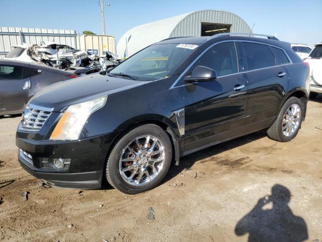 CADILLAC SRX PERFOR 2013 with VIN 3GYFNHE30DS597706 - Photo from auction