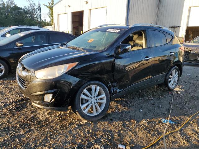 HYUNDAI TUCSON GLS 2011 with VIN KM8JUCAC7BU274354 - Photo from auction