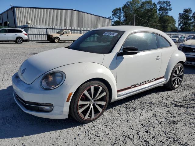 VOLKSWAGEN BEETLE TUR 2012 with VIN 3VWVA7AT3CM603818 - Photo from auction