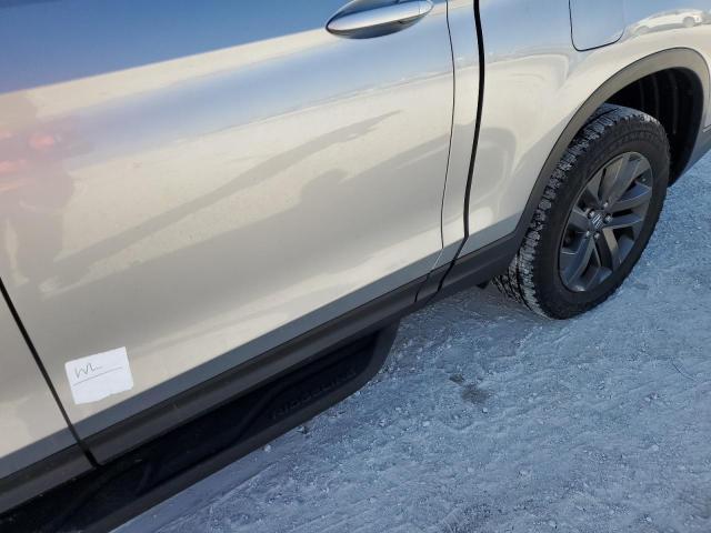 Photo 13 from auction – 2021 HONDA RIDGELINE with VIN 5FPYK3F19MB004867