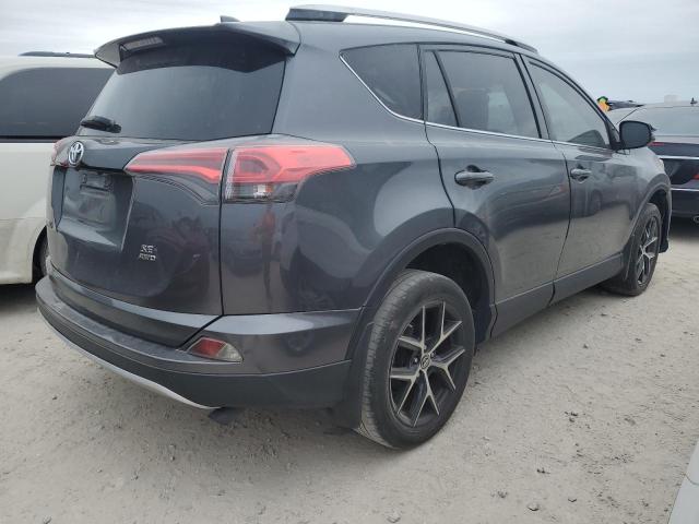 Photo 3 from auction – 2016 TOYOTA RAV4 SE with VIN JTMJFREV2GD191595