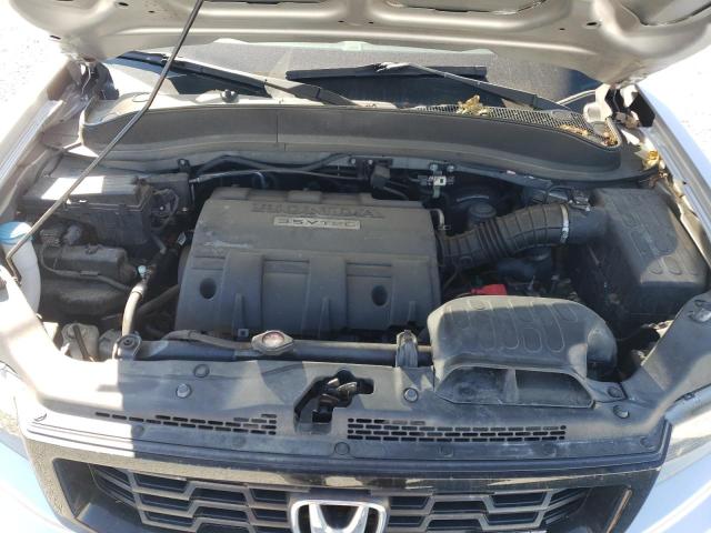 Photo 11 from auction – 2014 HONDA RIDGELINE with VIN 5FPYK1F71EB011953