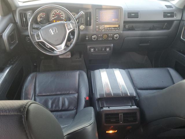 Photo 8 from auction – 2010 HONDA RIDGELINE with VIN 5FPYK1F58AB007262