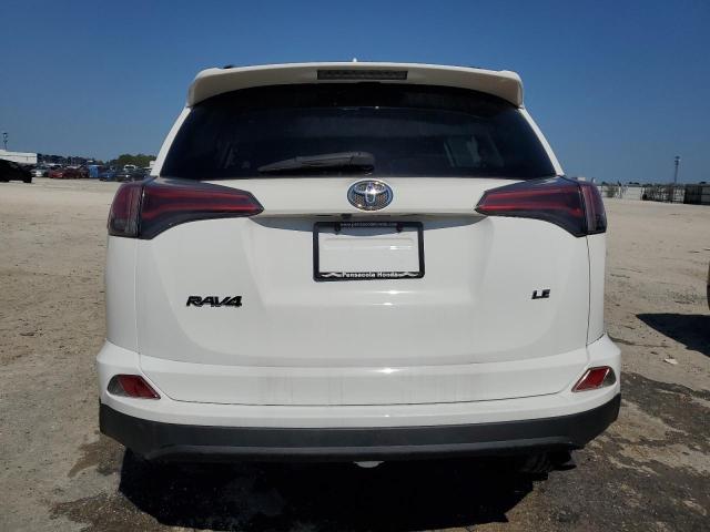 Photo 6 from auction – 2018 TOYOTA RAV4 LE with VIN JTMZFREV2JJ158723
