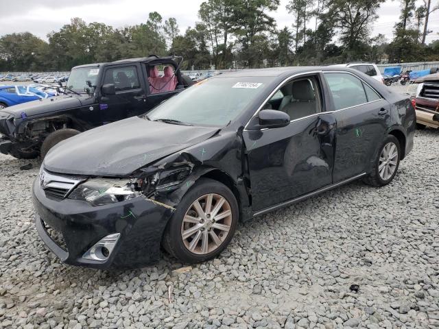 TOYOTA CAMRY L 2014 with VIN 4T1BF1FK8EU850511 - Photo from auction