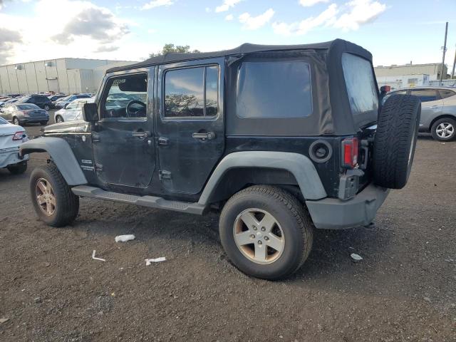 Photo 2 from auction – 2011 JEEP WRANGLER U with VIN 1J4BA3H15BL623209