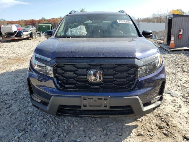 Photo 5 from auction – 2022 HONDA PASSPORT E with VIN 5FNYF8H02NB013166