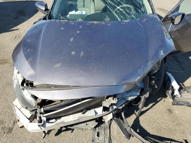 Photo 11 from auction – 2019 HONDA CIVIC LX with VIN 19XFC2F63KE200311