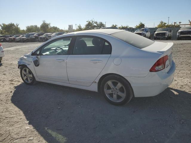 Photo 2 from auction – 2011 HONDA CIVIC LX-S with VIN 19XFA1F65BE030405