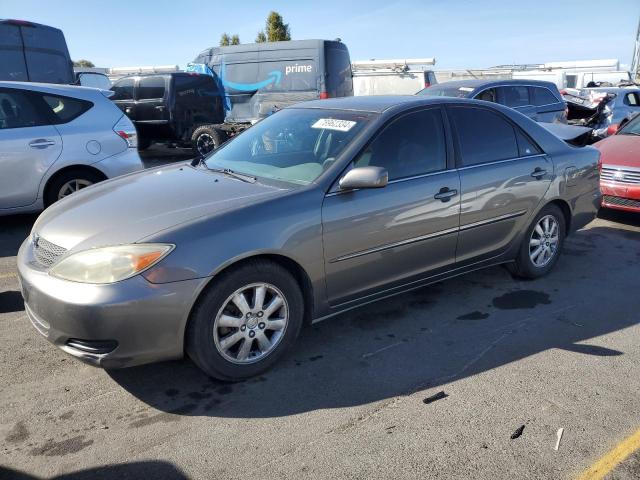 TOYOTA CAMRY LE 2002 z numerem VIN JTDBE30K620122555 - Zdjęcie z aukcji