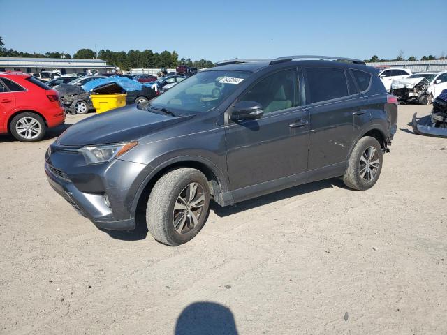 TOYOTA RAV4 XLE 2017 with VIN JTMRFREV0HD213436 - Photo from auction