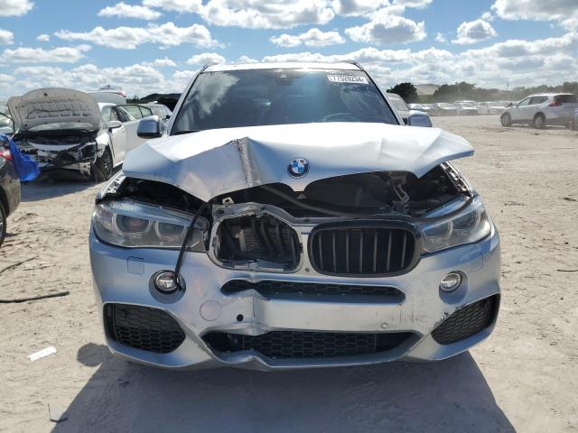 Photo 5 from auction – 2016 BMW X5 XDRIVE5 with VIN 5UXKR6C52G0J80339
