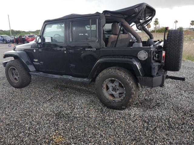 Photo 2 from auction – 2011 JEEP WRANGLER U with VIN 1J4BA5H14BL608843