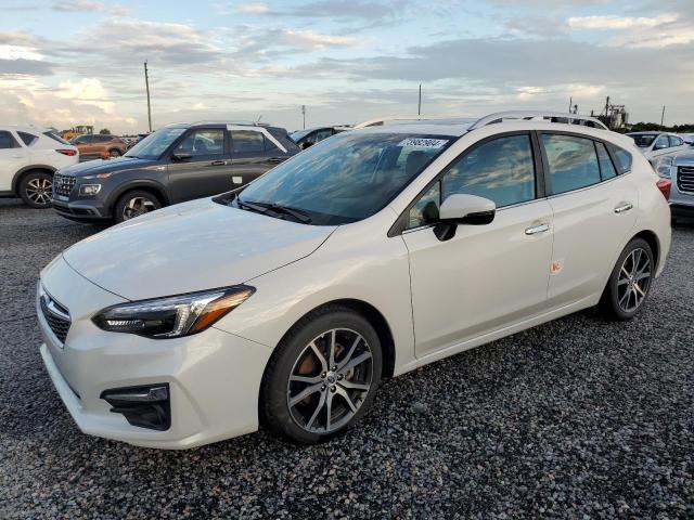SUBARU IMPREZA LI 2019 with VIN 4S3GTAU61K3745593 - Photo from auction