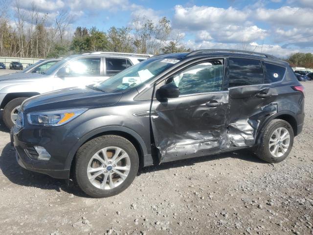FORD ESCAPE SE 2018 with VIN 1FMCU0GD8JUC85403 - Photo from auction