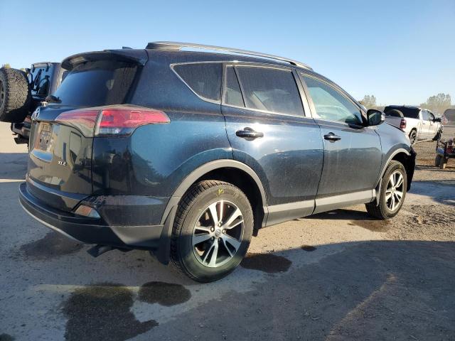 Photo 3 from auction – 2017 TOYOTA RAV4 XLE with VIN 2T3WFREV4HW367329