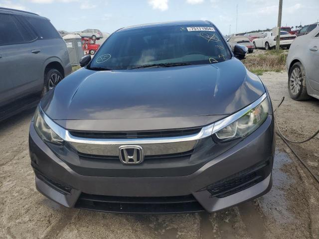 Photo 5 from auction – 2018 HONDA CIVIC LX with VIN 19XFC2F51JE005393