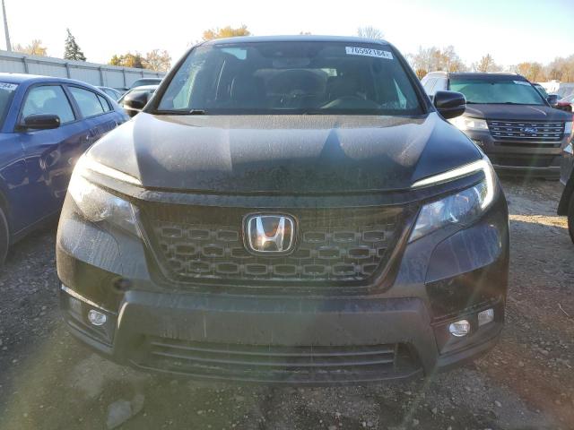 Photo 5 from auction – 2021 HONDA PASSPORT E with VIN 5FNYF8H58MB015546