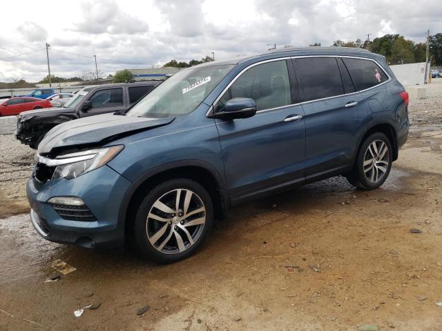 HONDA PILOT TOUR 2016 with VIN 5FNYF6H96GB024175 - Photo from auction