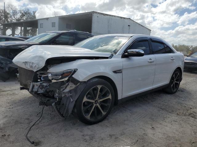 FORD TAURUS SEL 2014 with VIN 1FAHP2E85EG174613 - Photo from auction