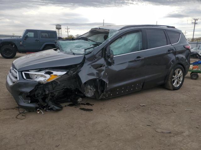 FORD ESCAPE SE 2018 with VIN 1FMCU9GD8JUA74383 - Photo from auction
