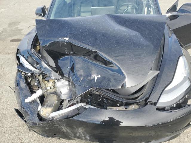 Photo 11 from auction – 2019 TESLA MODEL 3 with VIN 5YJ3E1EA5KF410013