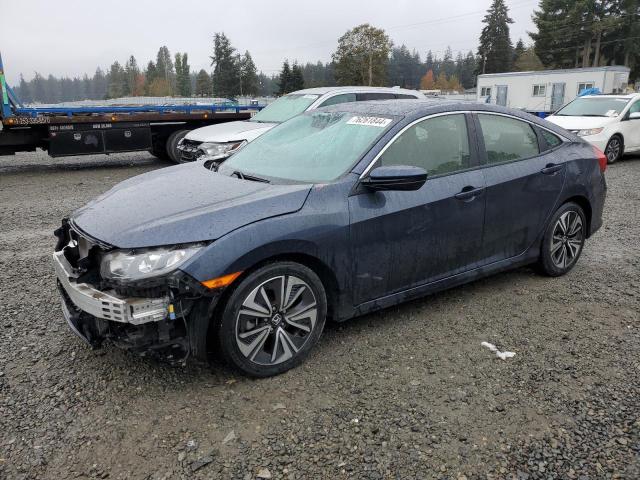 HONDA CIVIC EX 2018 with VIN JHMFC1F39JX023096 - Photo from auction
