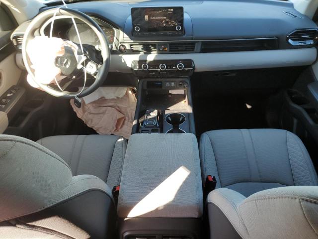 Photo 8 from auction – 2023 HONDA PILOT LX with VIN 5FNYG1H22PB022488