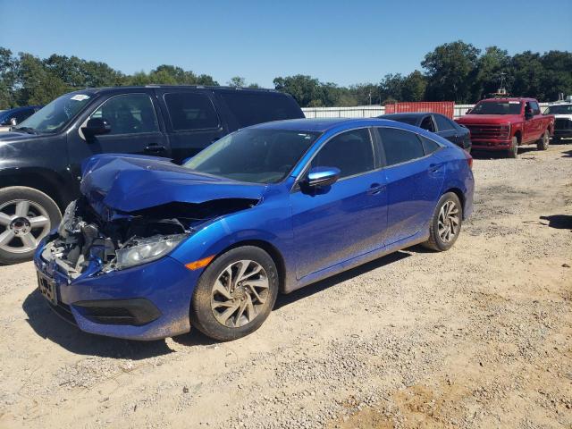 HONDA CIVIC EX 2018 with VIN 19XFC2F7XJE013851 - Photo from auction