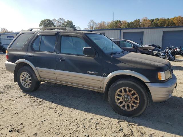 Photo 4 from auction – 2002 HONDA PASSPORT E with VIN 4S6DM58W324404520