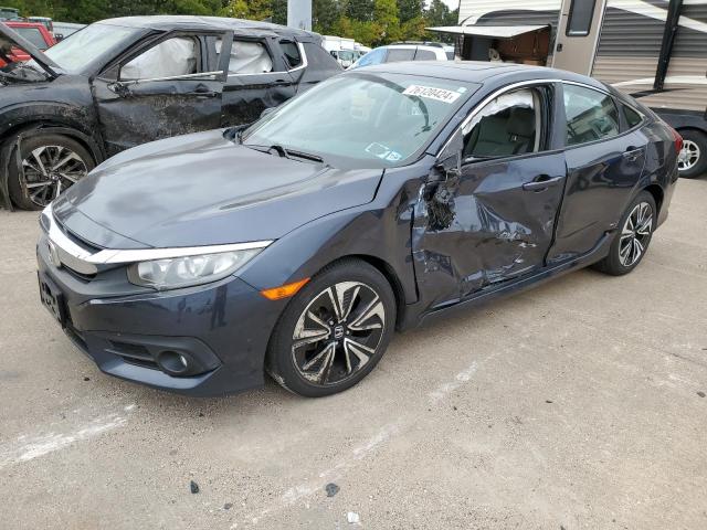 HONDA CIVIC EX 2017 with VIN 2HGFC1F39HH640399 - Photo from auction