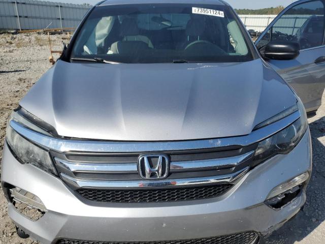 Photo 12 from auction – 2017 HONDA PILOT LX with VIN 5FNYF6H19HB103075