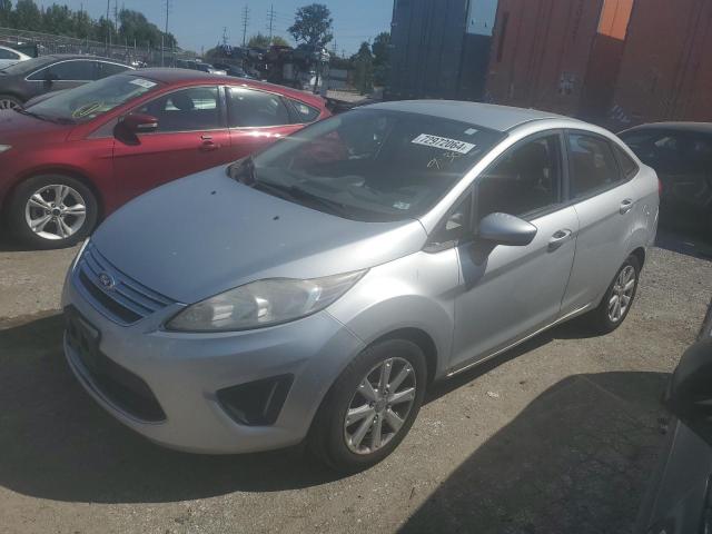 FORD FIESTA SE 2011 with VIN 3FADP4BJ7BM239092 - Photo from auction